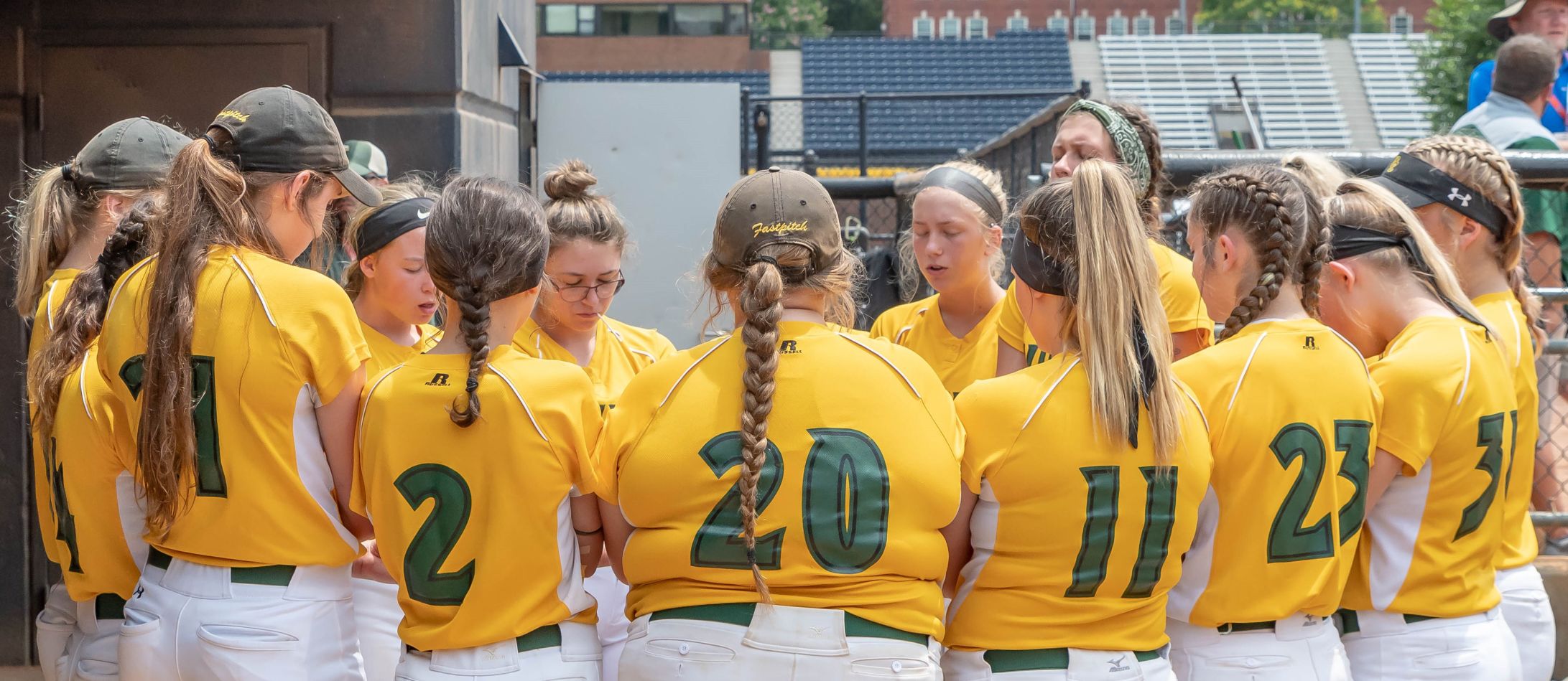 DuringNorth Carolina High School 3A Softball State Playoffs at UNC Greensboro University field,Greensboro,North Carolina, The Central Cabarrus Vikings battled Eastern Alamance for the State Championship in softball. The Vikings lost 4-2 in eight innings.. Viking players say a prayer before the game.